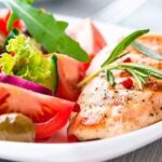 Juicy griddled chicken breast with fresh salad