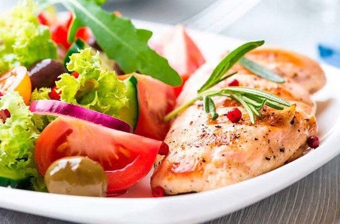 Juicy griddled chicken breast with fresh salad