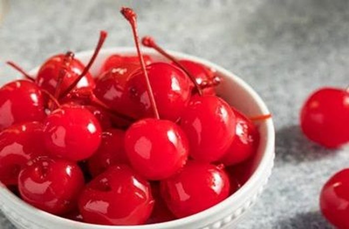 Maraschino cherries for garnishing an amaretto sour