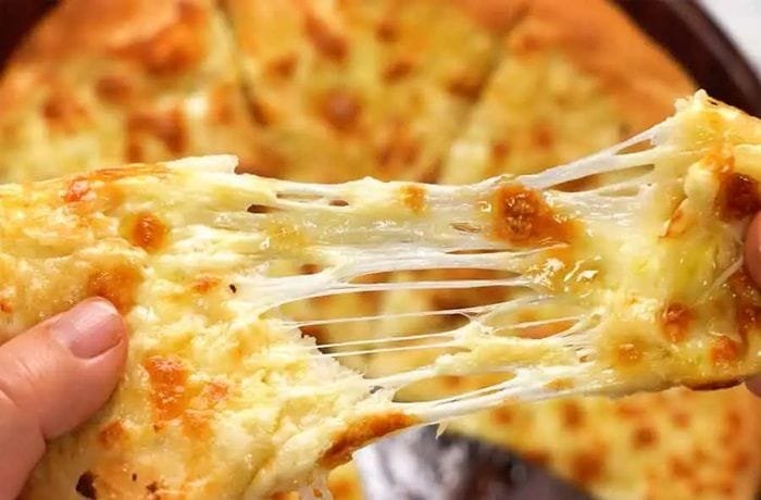Melted cheese the way it should look on homemade pizzetas