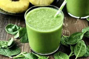 Natural green juice with cucumber, apple, and spinach