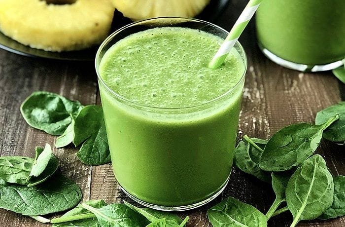 Natural green juice with cucumber, apple, and spinach