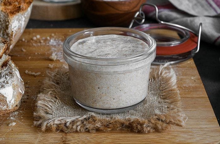 Homemade natural sourdough starter in a jar