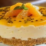 No bake passion fruit cheesecake with a glossy passion fruit topping