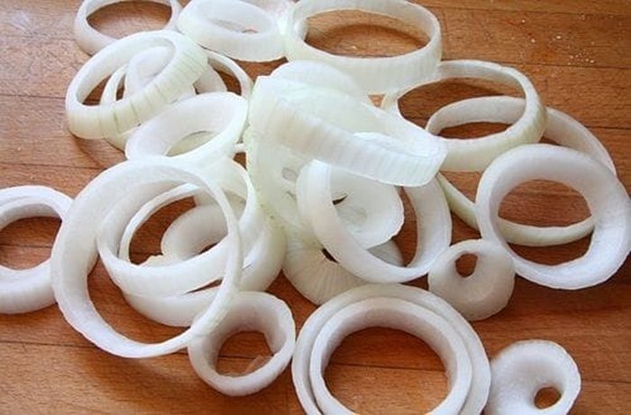 Onion sliced into thick rings for frying