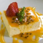 Passion fruit mousse in dessert cups topped with fresh passion fruit pulp