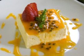 Passion fruit mousse in dessert cups topped with fresh passion fruit pulp