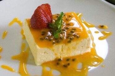 Passion fruit mousse in dessert cups topped with fresh passion fruit pulp