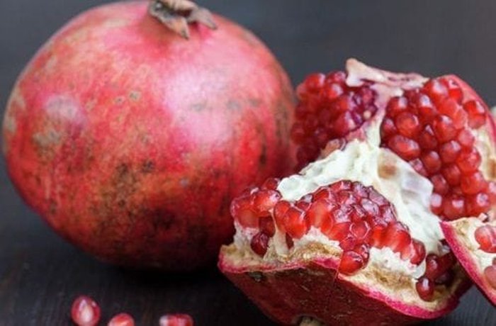 Ripe pomegranates for homemade grenadine syrup