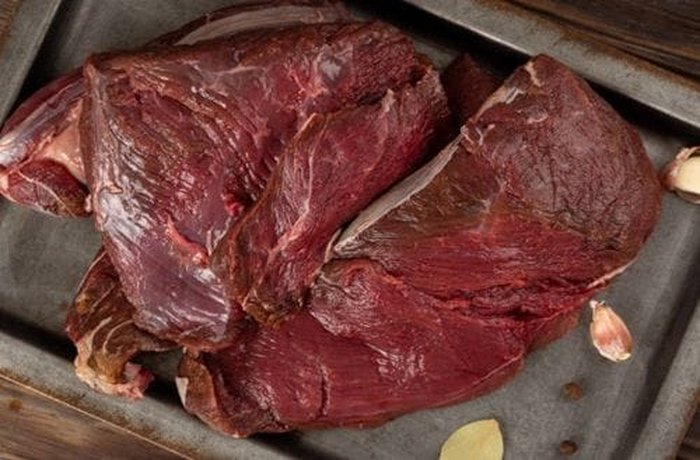 Raw wild boar meat cut for stew
