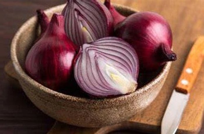 Red onion sliced for quick pickled red onions