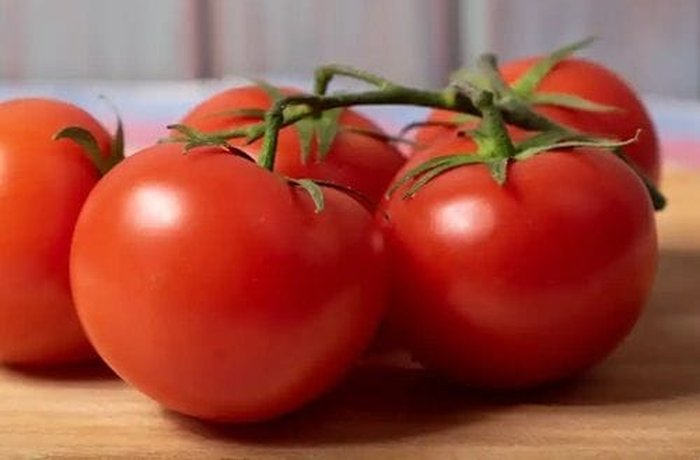 Ripe round tomatoes for homemade tomato juice