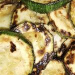 Sautéed zucchini slices with garlic and oregano