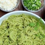 Spaghetti tossed in a creamy avocado sauce with cilantro and parmesan