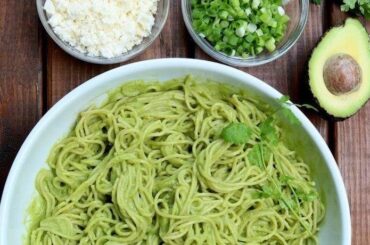 Spaghetti tossed in a creamy avocado sauce with cilantro and parmesan