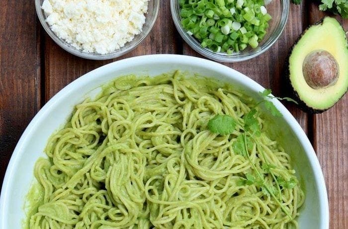 Spaghetti tossed in a creamy avocado sauce with cilantro and parmesan