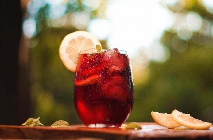 Tinto de verano, red wine with lemon soda, ice, and lemon slices