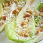 Traditional Caesar salad with croutons and Parmesan