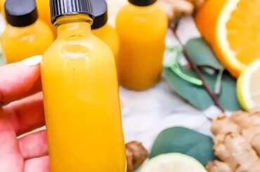 Turmeric and ginger shots with lemon and orange
