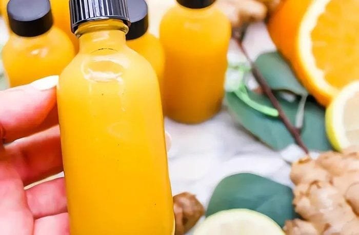 Turmeric and ginger shots with lemon and orange