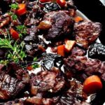 Wild boar stew braised in red wine with potatoes and carrots