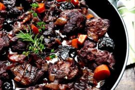Wild boar stew braised in red wine with potatoes and carrots